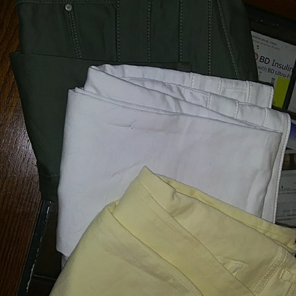Three pairs of skinny jeans.